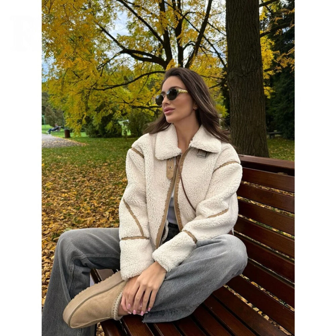 Elegant dame vinterjakke, dobbeltsidig i svart/khaki. Allsidig og komfortabel reversjakke med stil.