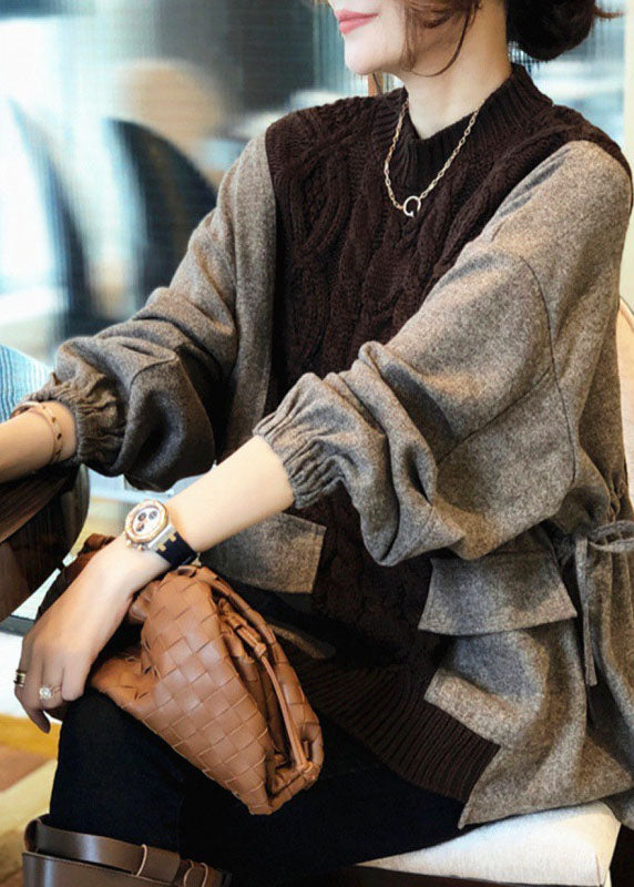Stilfull dame strikkegenser med patchwork detaljer, perfekt for høst og vinter, komfortabel og trendy.