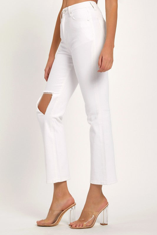 Komfortable damejeans i hvit med trendy slitasje, egnet for en fresh og avslappet vår- og sommerlook.