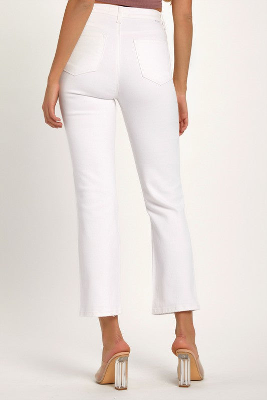 Stilige hvite slitte damejeans med moderne design, en komfortabel og allsidig bukse for trendy antrekk.