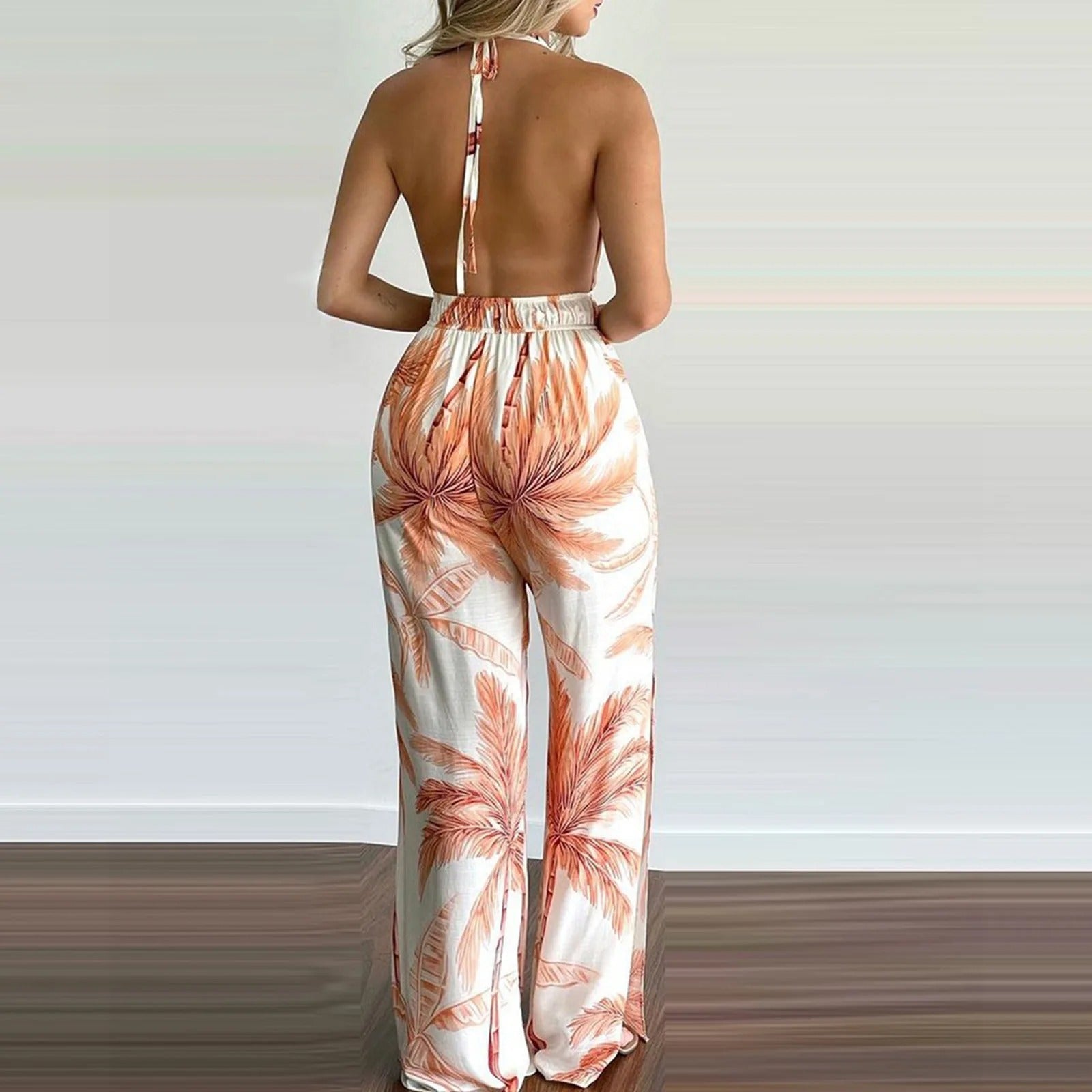 Elegant og komfortabel dame jumpsuit med digitaltrykk, V-hals og ermeløs stil for sommerdager.