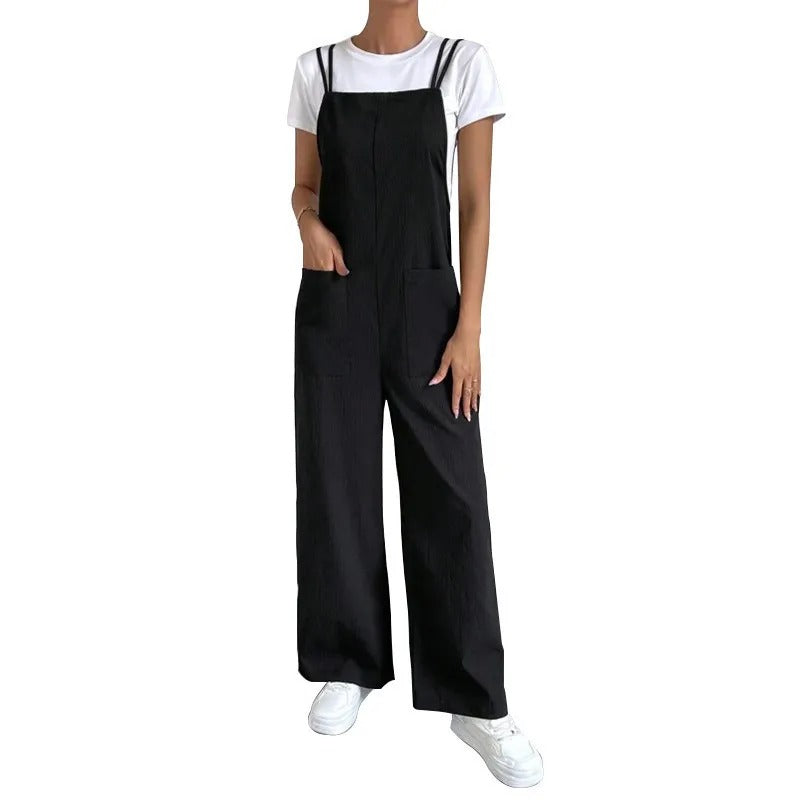 Dame jumpsuit med seler og vid benpassform, perfekt for komfortabel og stilfull hverdagsbruk. Allsidig antrekk.