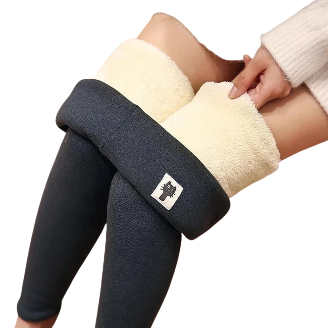 Svarte dame leggings med høy midje, ideelle for vinterbruk. Gir varme og en flatterende passform.