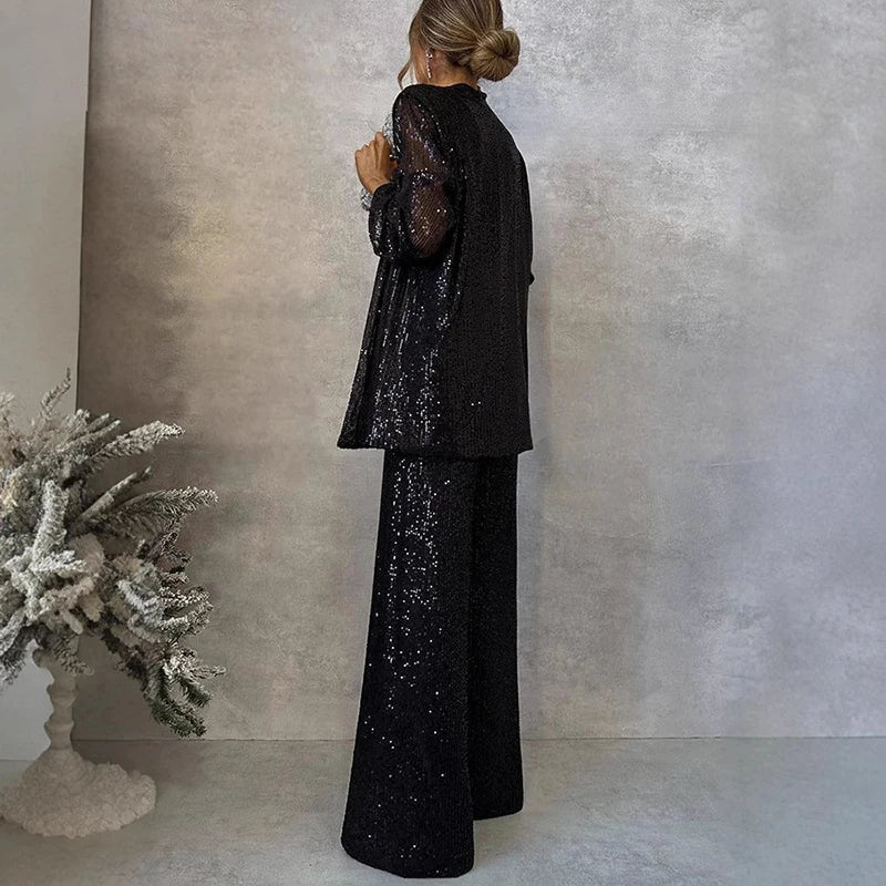 Elegant dame paljetttopp og matchende høy liv bukse, ideelt for kveldsbruk og moteriktige antrekk.