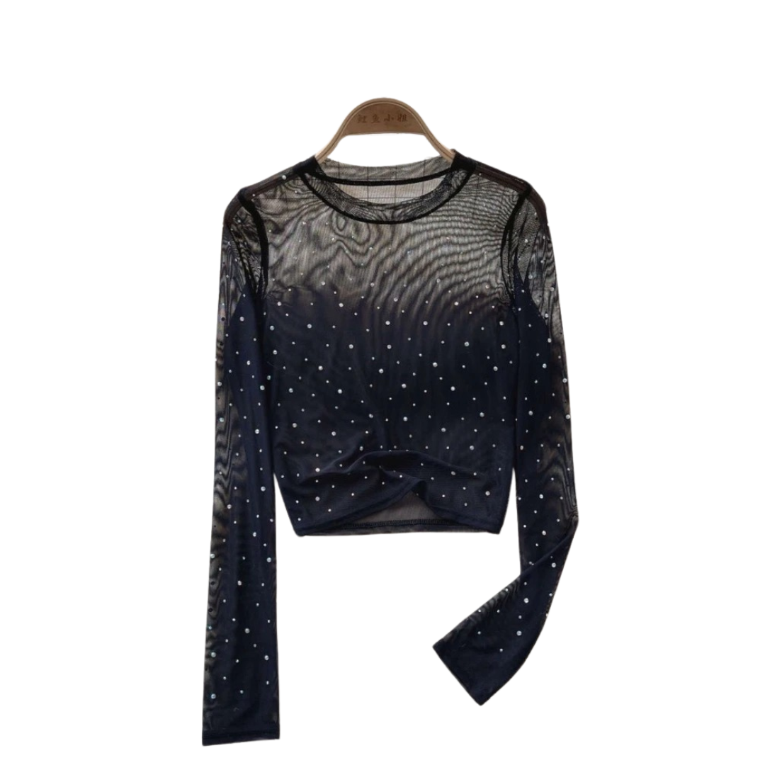 Glittertopp dame. Trendy langermet crop top med rhinestones, slimfit og glamorøs for festmote.