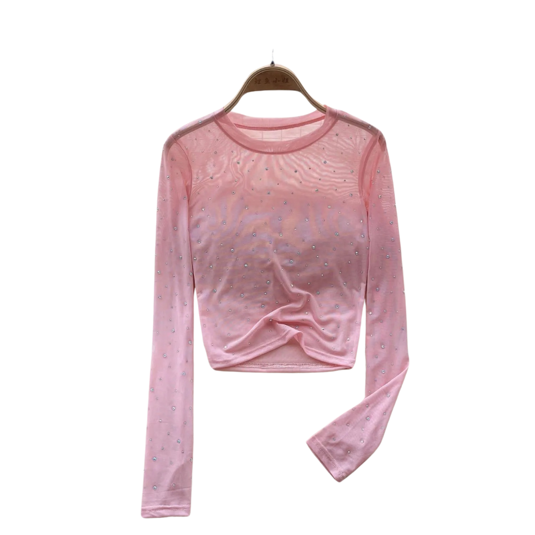 Motebevisst dame crop top med rhinestones. Langermet glittertopp, slimfit, ideell for festantrekk.