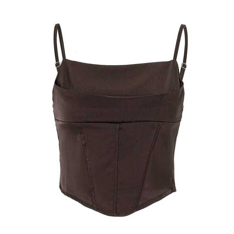 Dame ryggløs crop-topp med justerbar snøring i elegant design. Perfekt for fest og sommer.