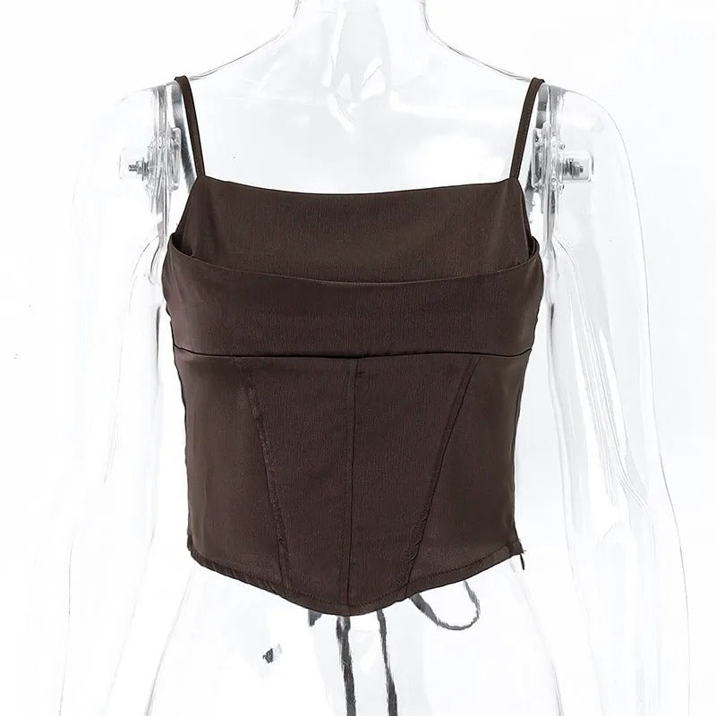Stilfull ryggløs crop-topp med justerbar snøring, designet for moderne kvinner og elegant mote.