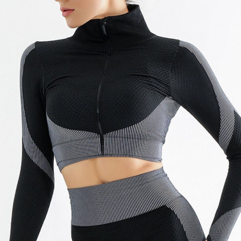 Stilren dame cropped yogatopp med glidelås. Perfekt for yoga, trening og fitness. Sømløs komfort.