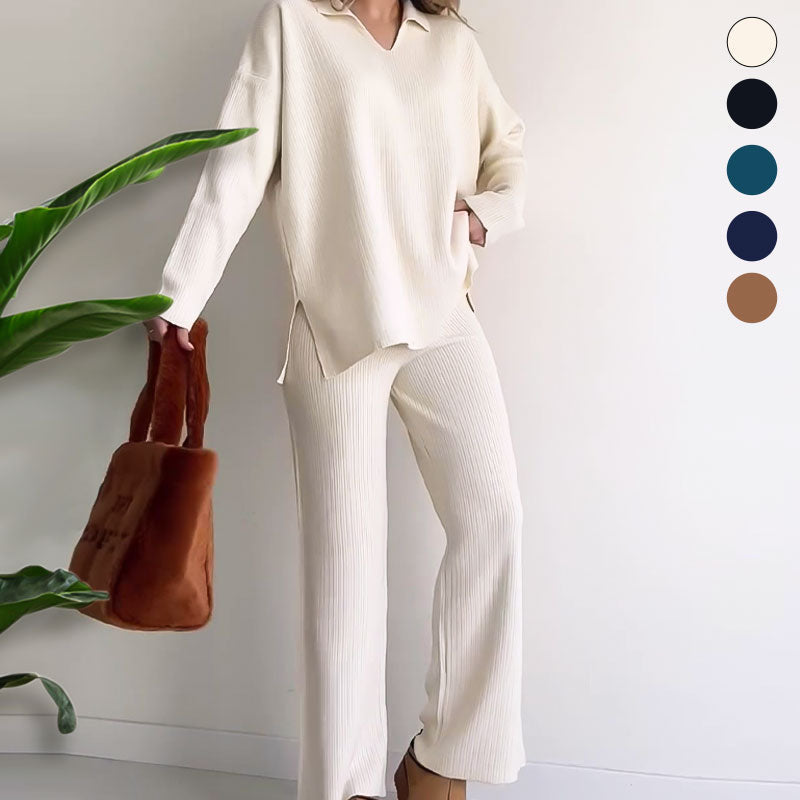Fullt damesett: V-hals topp og vide bukser vist på modell. Komfortabelt, elegant to-delt antrekk for vår/sommer.