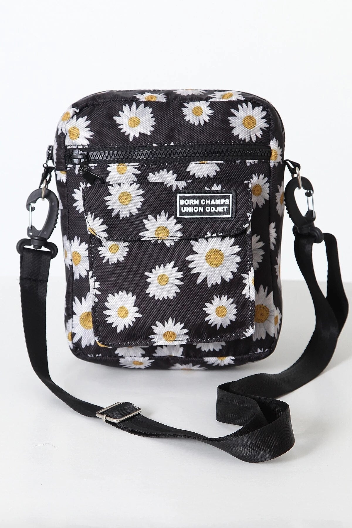 Dame tusenfryd skulderveske og crossbodyveske i canvas med blomstermønster, perfekt for sommerstil.