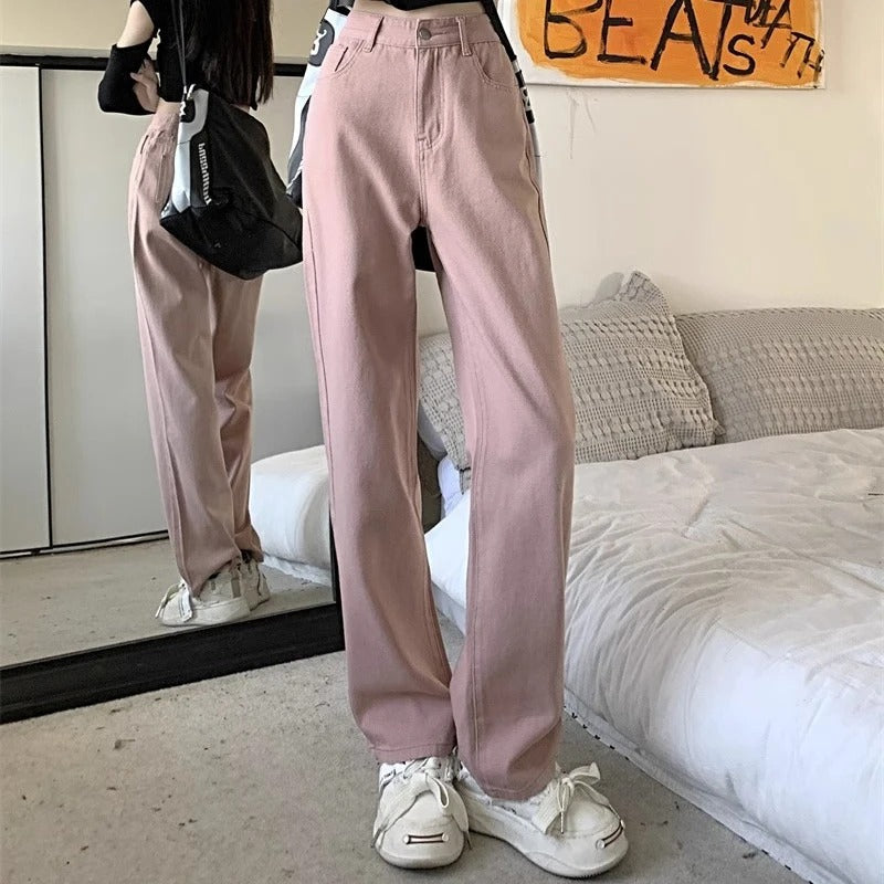 Streetwear dame vintage jeans med vide ben og høy midje i blå denim.
