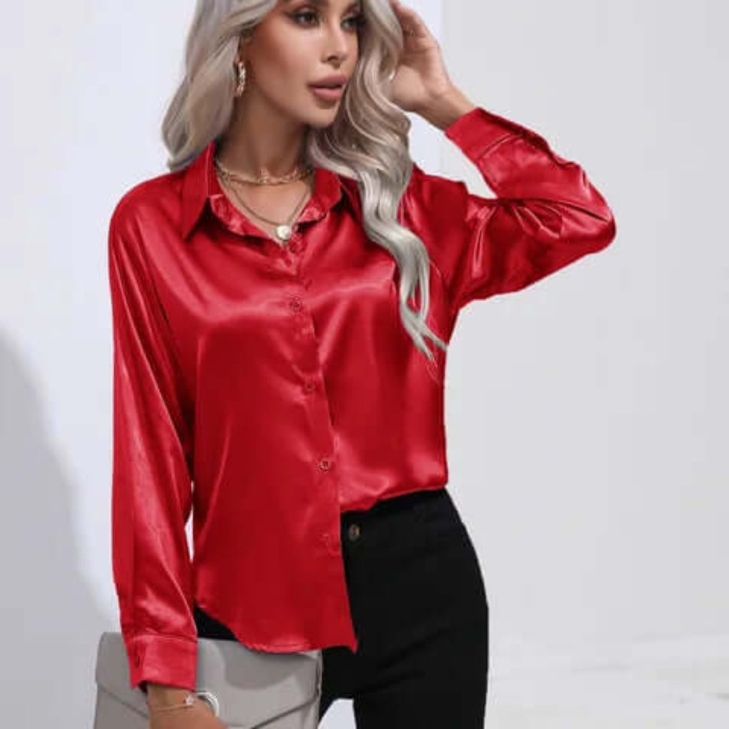 Klassisk damebluse med lange ermer og avslappet passform. Et must-have i garderoben.