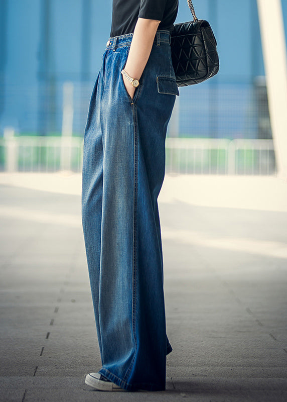 Elegante damebukser med høy midje og trendy vide ben. Perfekt for en stilfull og komfortabel look hele dagen.