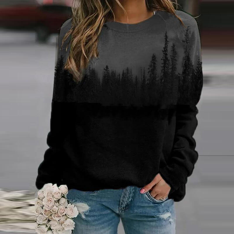 Stilfull damegenser med fjelltrykk. Avslappet passform, ideell for fritid og en trendy hverdagslook.