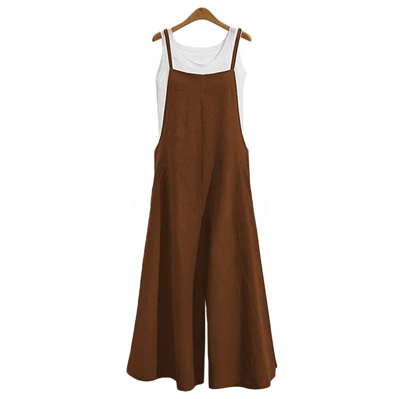 Løs damejumpsuit med vide ben og ermeløs design. Komfortabel og stilig for sommerbruk.