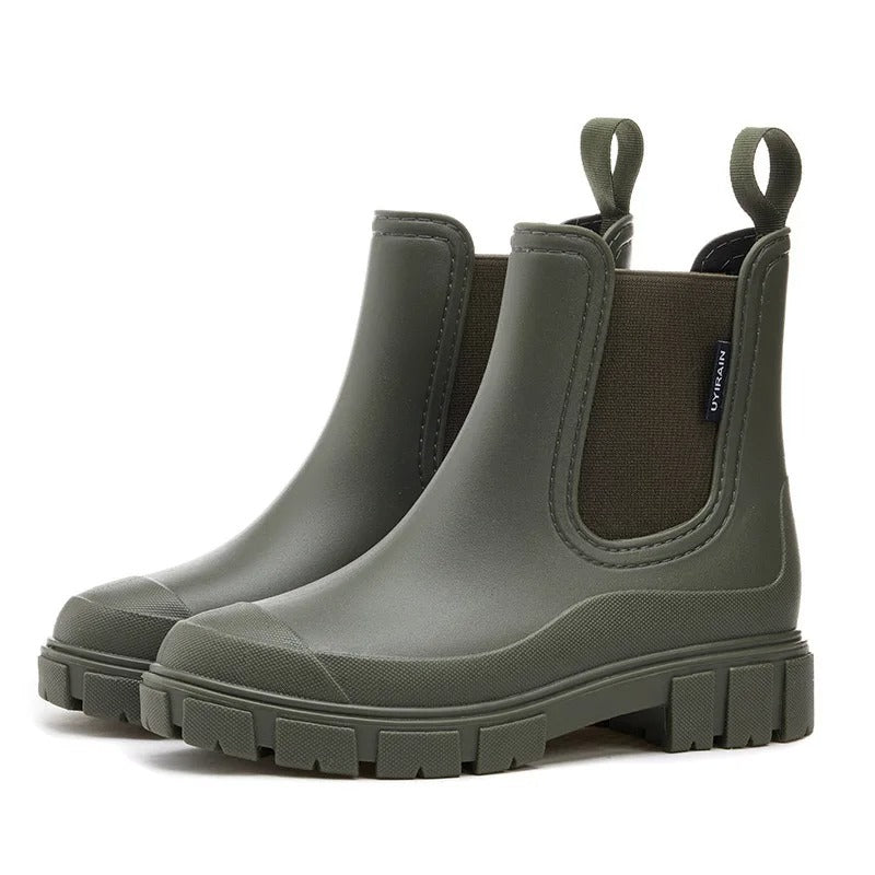 Stylische wasserdichte Frauenstiefel, Chelsea-Design, schwarz, knöchelhoch, geeignet für nasses Wetter.