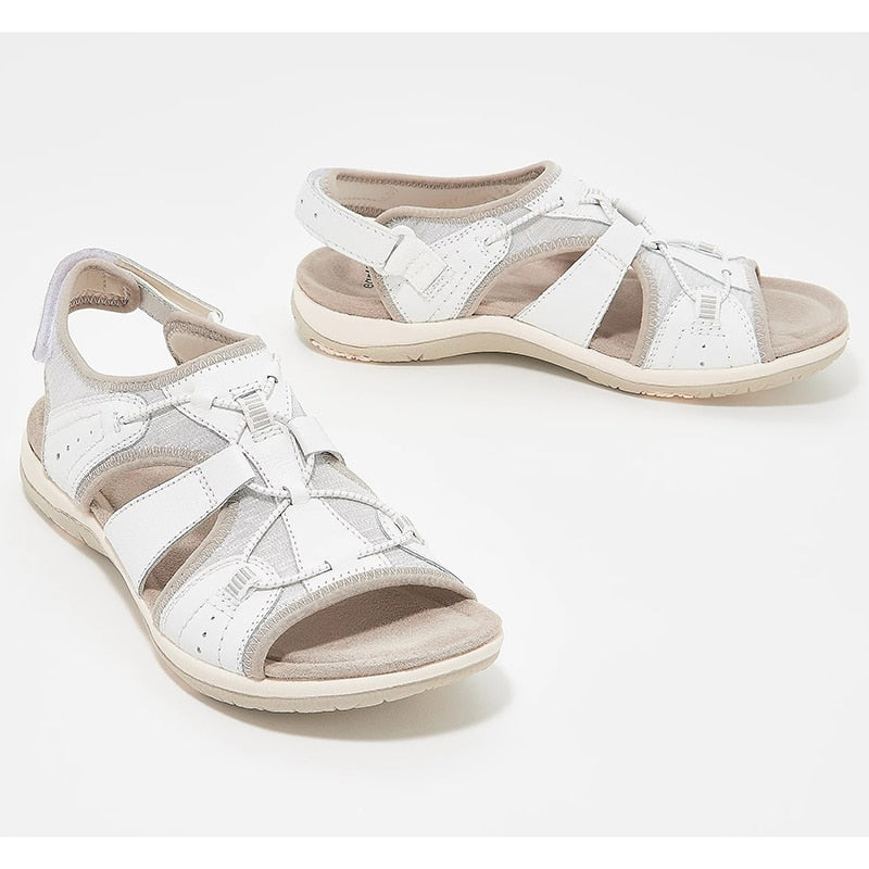 Sommersandaler for dame, åpen tå designet for strand og sol, gir komfort og stil.