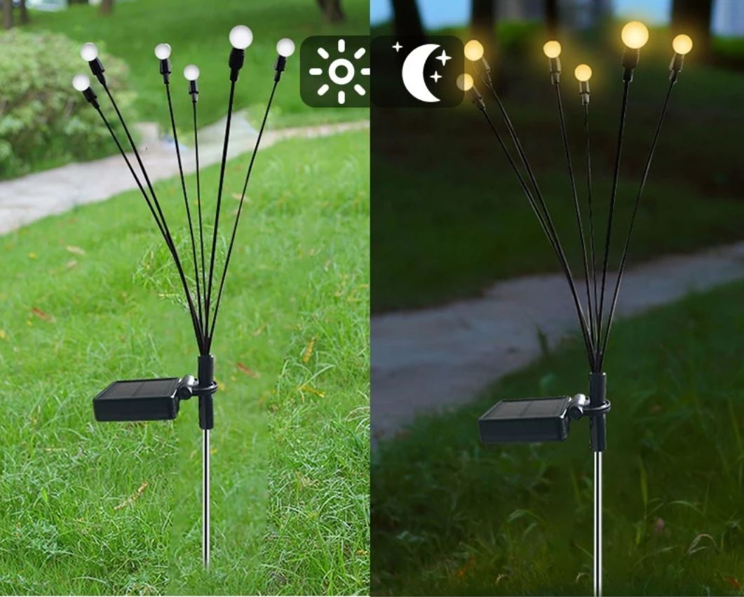 Mørk hage med glødende ildfluelys LED, solar-drevet hagebelysning som skaper magisk stemning utendørs.