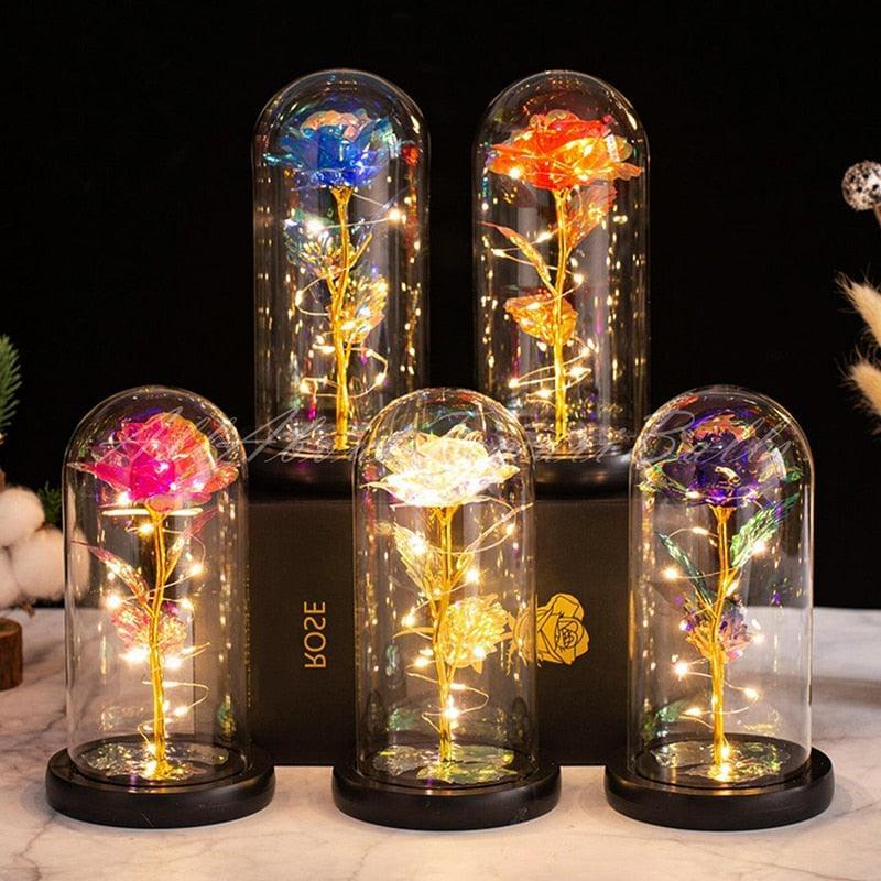 Romantisk kunstig galakse rose i glasskuppel med glitrende LED-lys, flott gaveidé