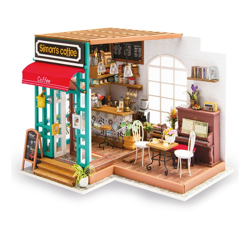 Pakke med et DIY miniatyrhussett i tre, en spennende kreativ gave og byggeutfordring.