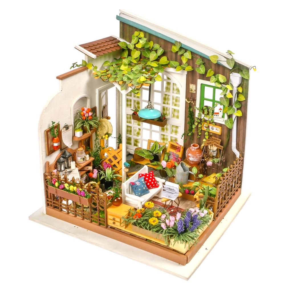 Illustrasjon av hvordan et DIY miniatyrhussett i tre monteres, trinn for trinn.