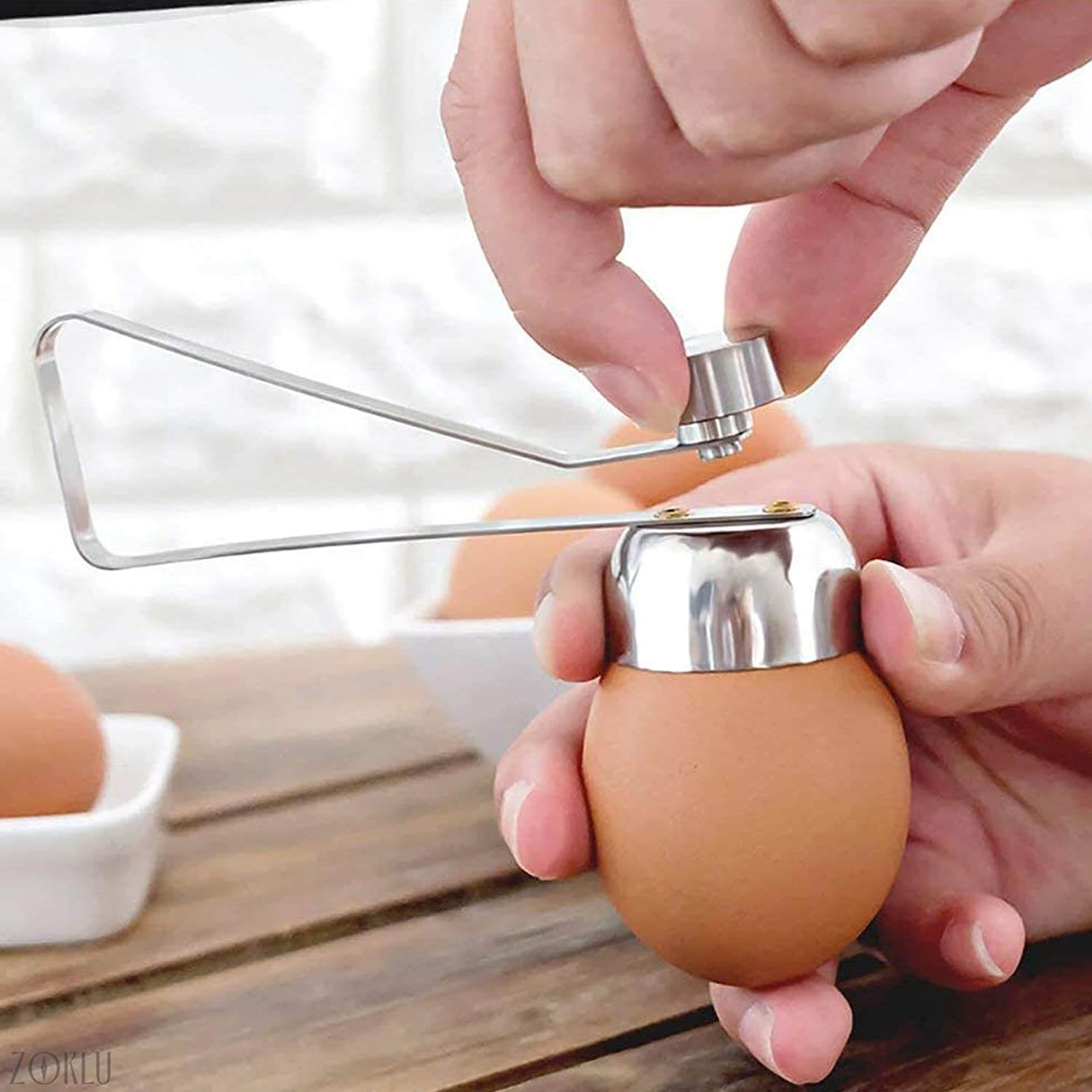 Kjøkkenutstyr: Eggeåpner/eggestopper for enklere matlaging av perfekte egg.