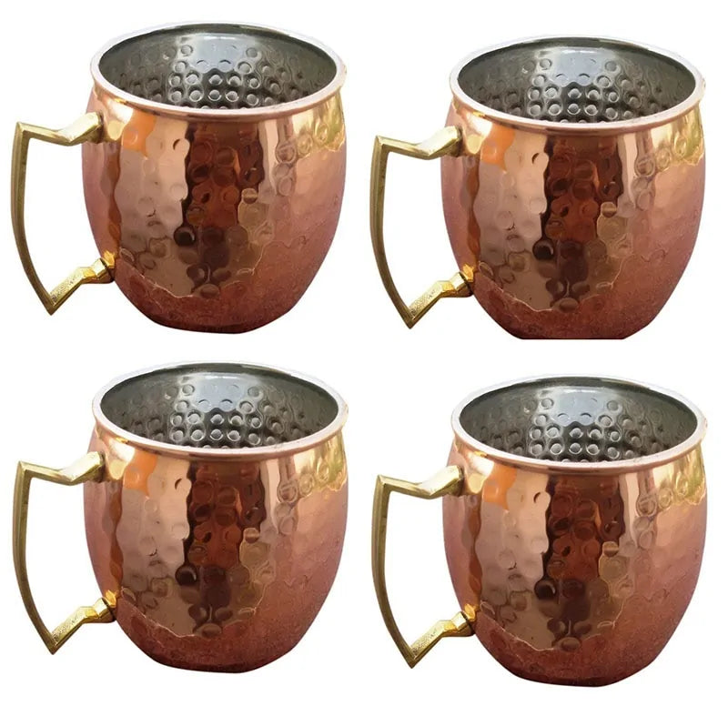 Eksklusivt sett med 4 hamrede kobberkopper for kalde drikker. Perfekt for cocktails og sommerfester.