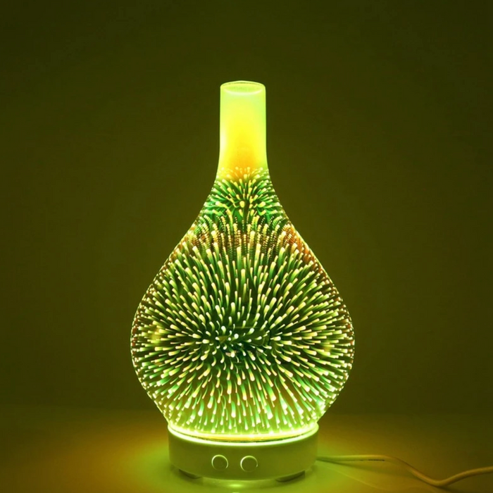 Dekorativ essensiell olje diffusor med LED lys i elegant glassvase for stue og soverom.