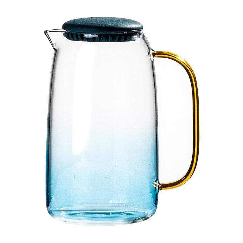 Elegant blått borosilikatglass karaffelsett med matchende drikkeglass for servering av drikkevarer.