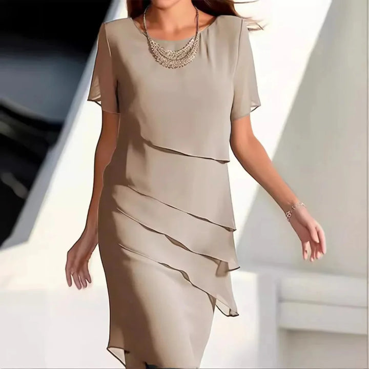 Elegant chiffon midikjole for kvinner, perfekt for fest og sommer. Komfortabel og stilfull damekjole.