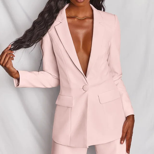 Komplett dame dressett med elegant blazer og vide ben bukser. Stilig og komfortabelt.