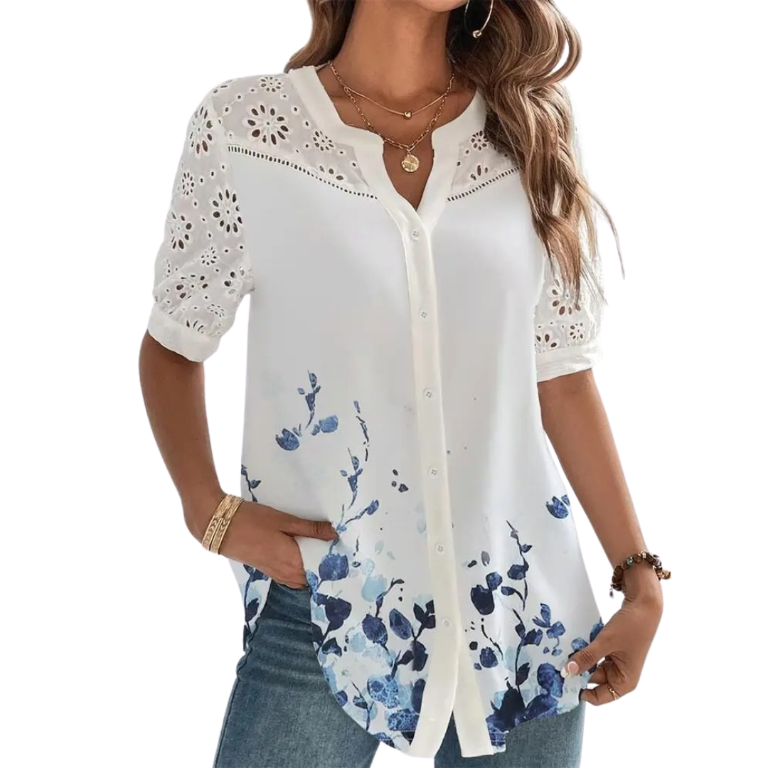 Stilig kortermet bluse med elegant blondekant. Perfekt for fritid, sommerstil og komfortabel hverdagsbruk.