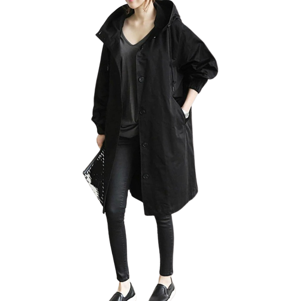 Elegant dame langfrakke med hette, perfekt for høst og vår. Varm, stilfull og komfortabel ytterjakke.
