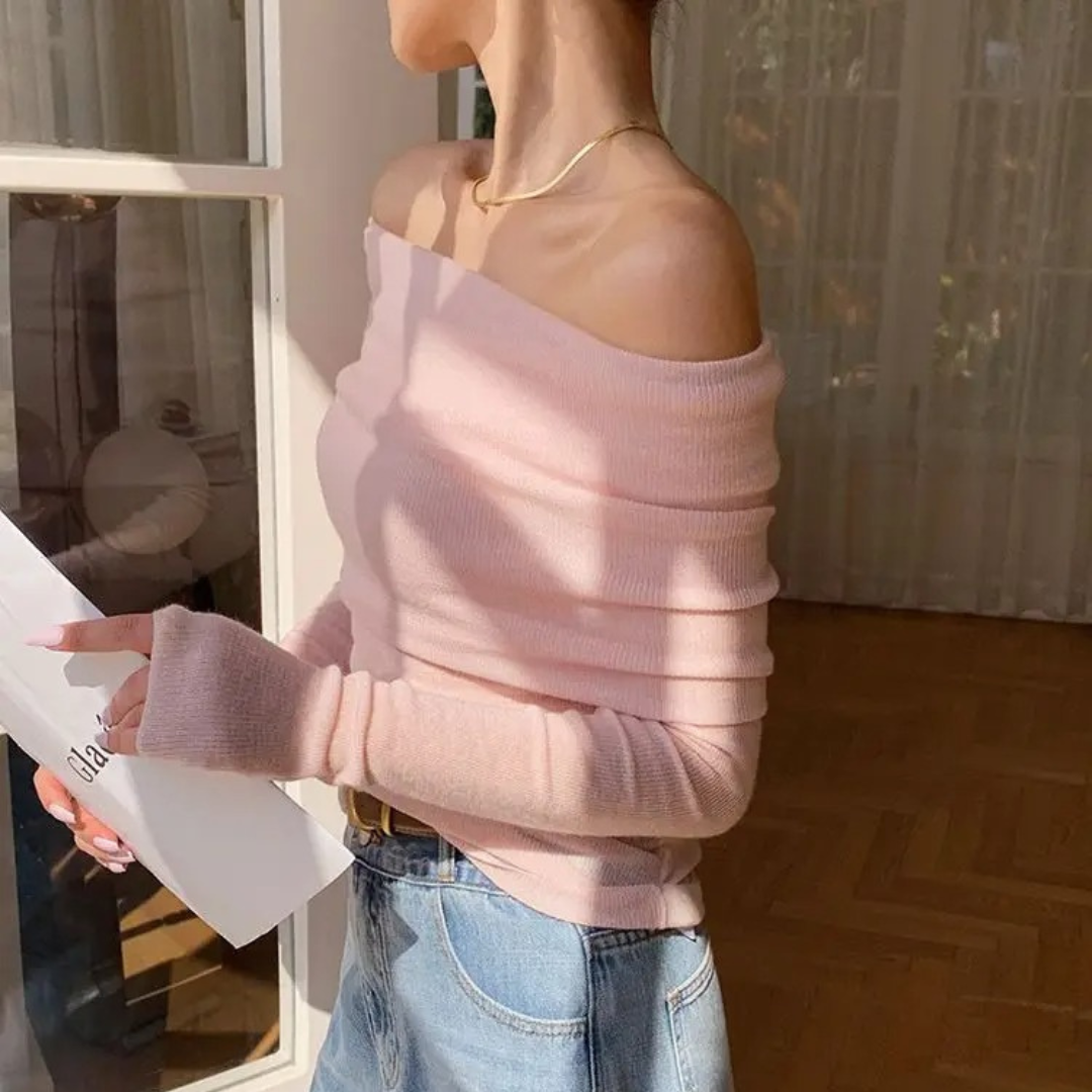 Dame off-shoulder topp i elegant slash neck stil, langermet og stylet for en moderne og chic look.