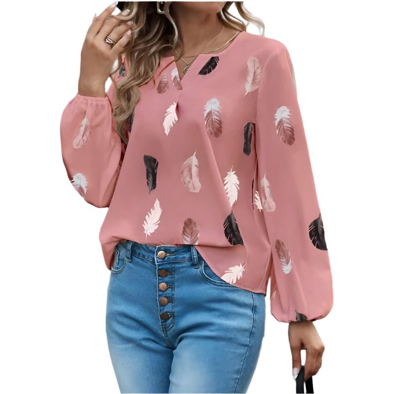Elegant damebluse med fjærmønster, perfekt for fritid og kontor. Trendy langermet topp for damer.