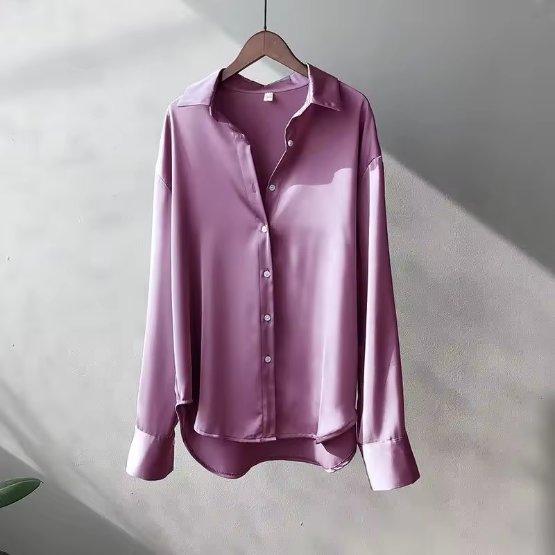 Elegant flerfarget langermet bluse for damer, perfekt for business og festlige anledninger.