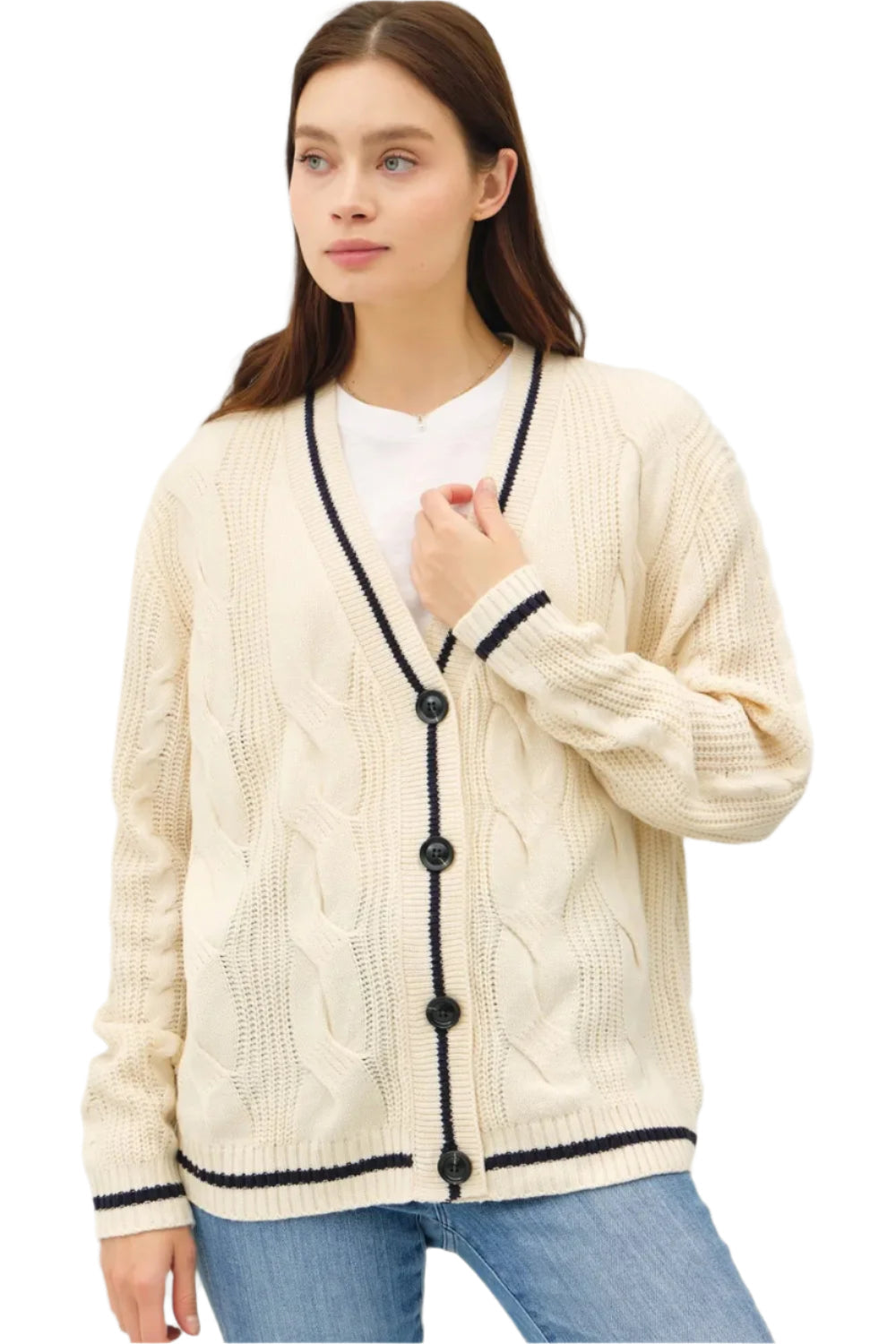 Elegant damecardigan med v-hals og stilig kontrastkant. Perfekt for lagpålag og moderne hverdagslook.