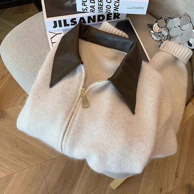 Vår- og høstgenser for kvinner med elegant kontrastkrage. Komfortabel og moderne overdel.
