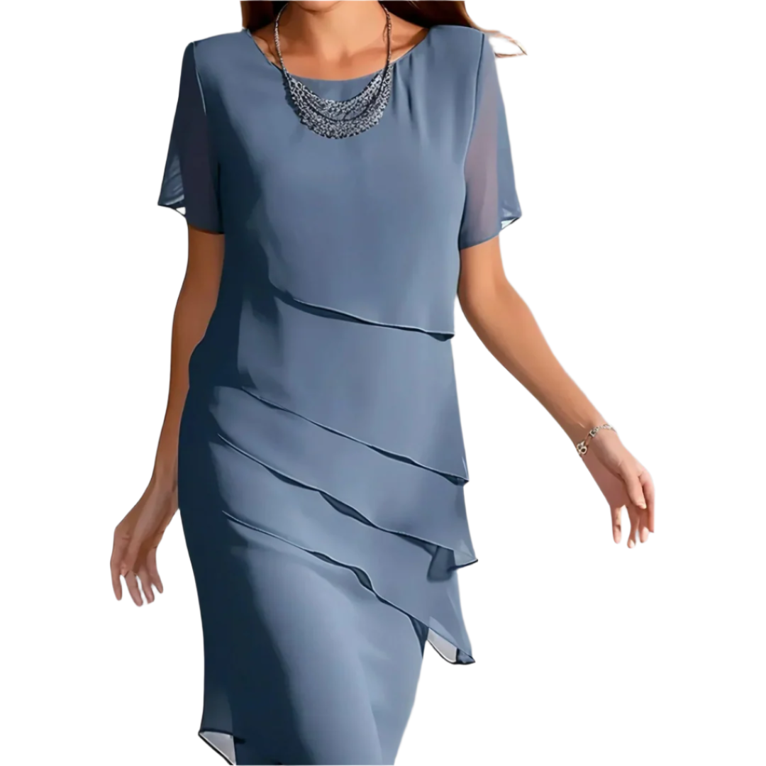 Elegant damekjole i chiffon, perfekt for fest og spesielle anledninger.