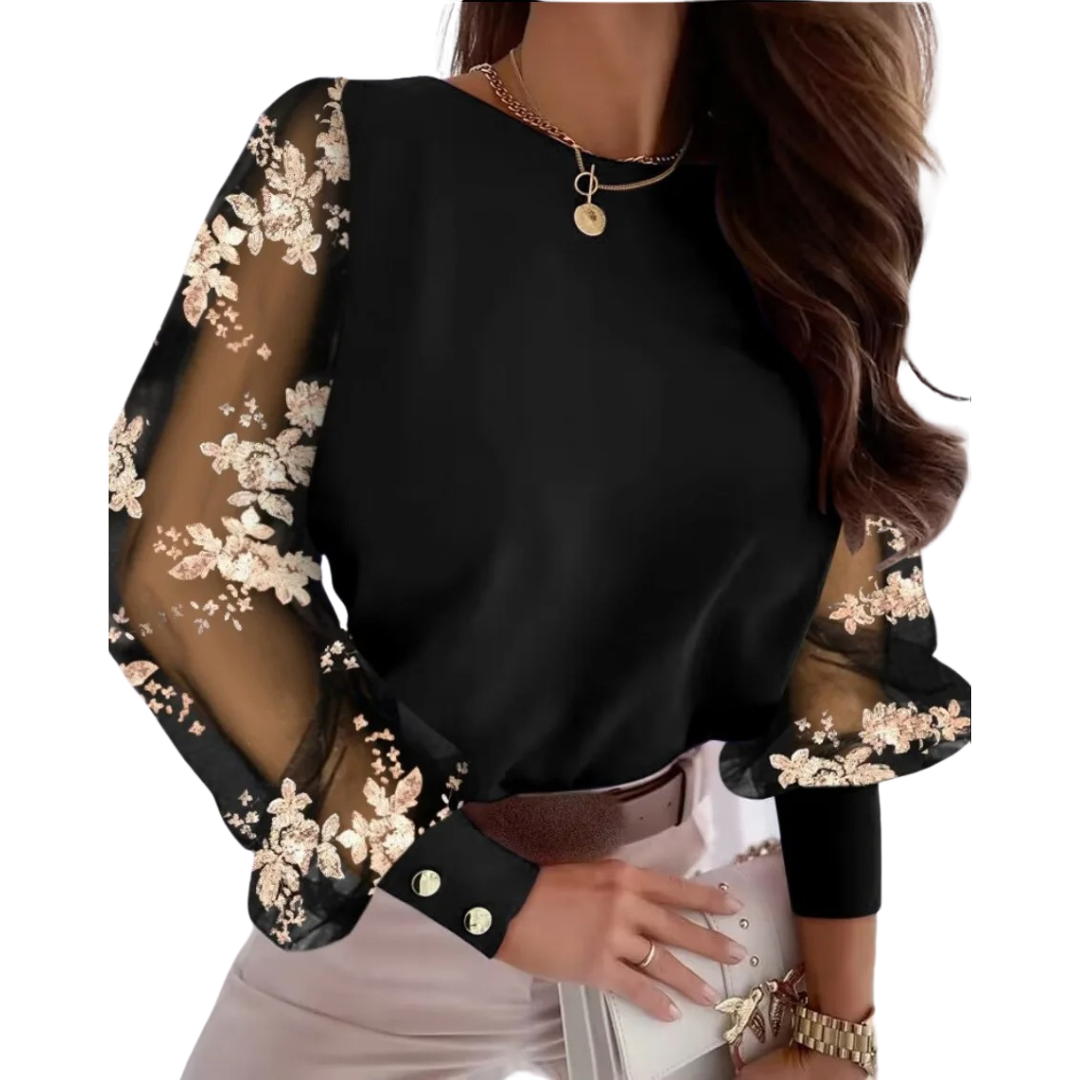 Stilren bluse for kvinner med elegante laterneermer og dekorative knapper, ideell for vår og sommerantrekk.