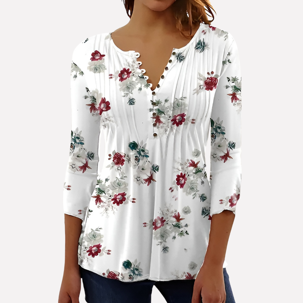 Blomstret dametopp i lett stoff, stilsikker og perfekt som sommer topp for kvinner.