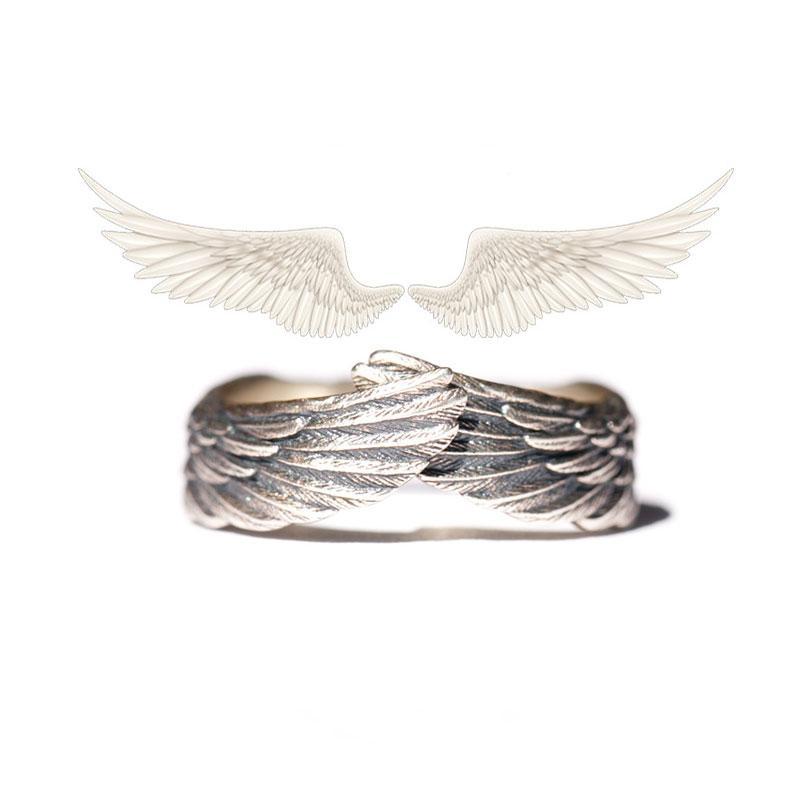 Sterlingsølv ring med englevinge motiv for kvinner; representerer fred, beskyttelse og stil.