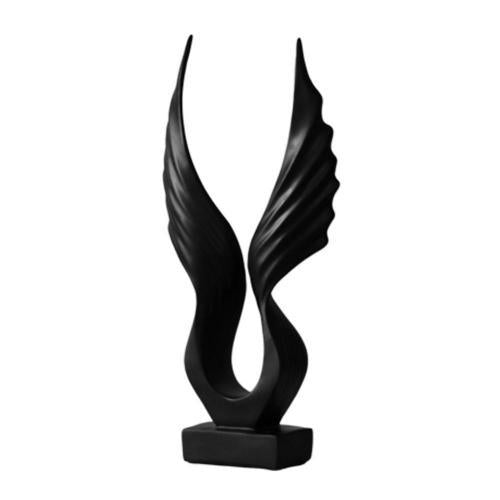 Symbolsk englevinge skulptur som inspirerer. En vakker del av interiørkunsten.