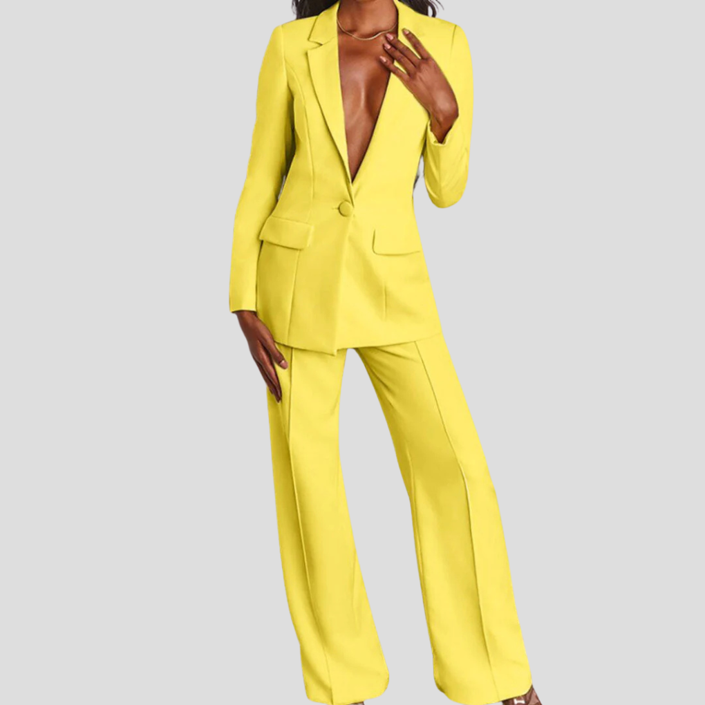 Elegant ensfarget blazer og buksesett for kvinner. Perfekt formelt kontorantrekk og business-look.