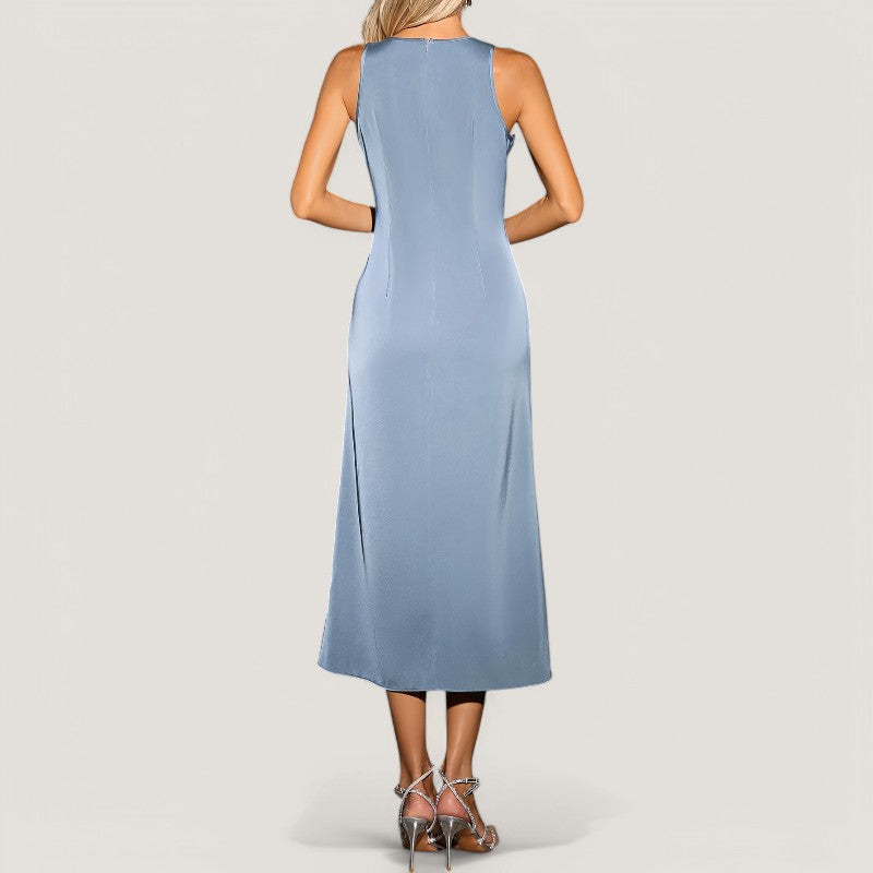 Stilig ermeløs langkjole i polyester, egnet som sommerkjole og festkjole for kvinner.