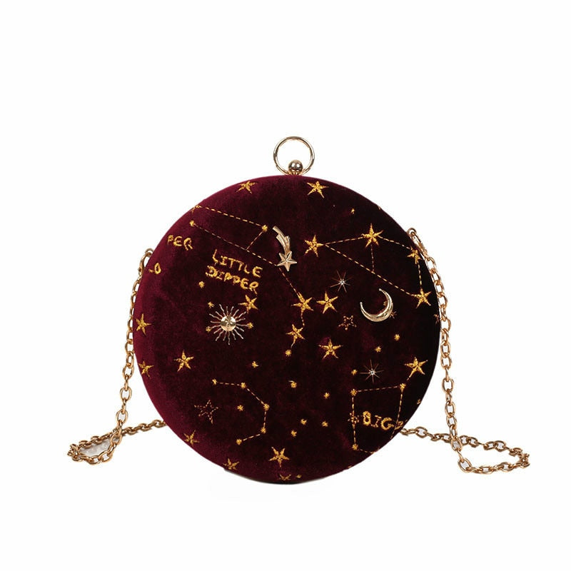 Rund fløyelsveske med glitrende stjerner. Trendy dameveske som kan brukes som skulder- eller crossbody-modell.