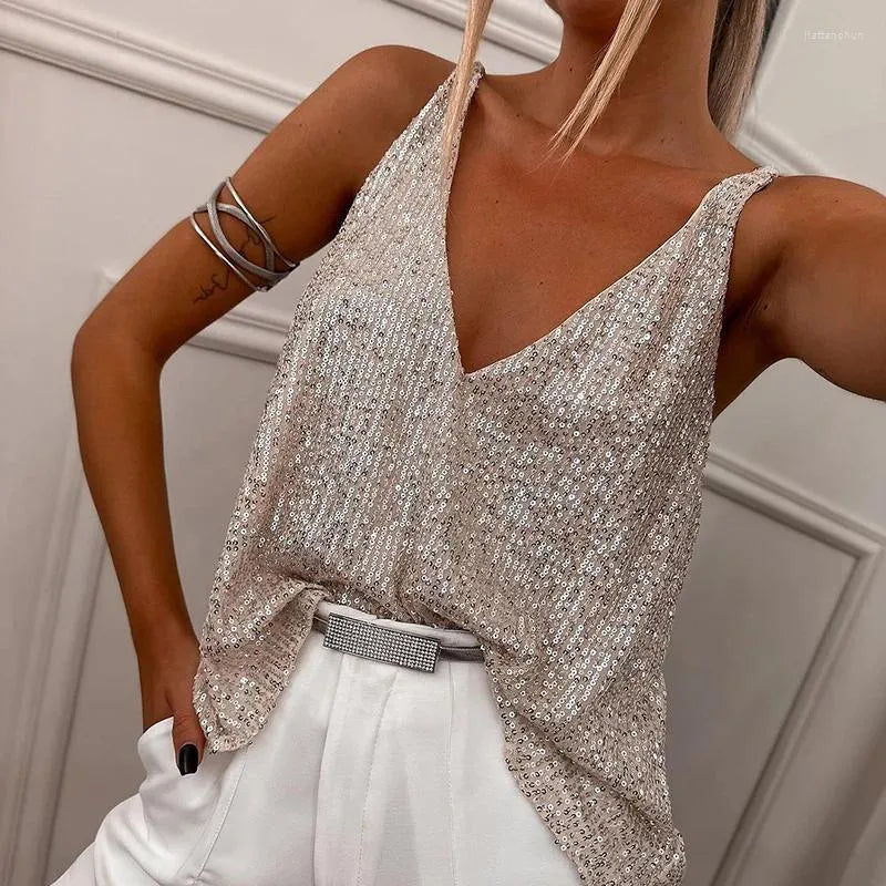 Strålende kvinnebluse med glitrende paljetter. En elegant og komfortabel festtopp, ideell for spesielle anledninger.