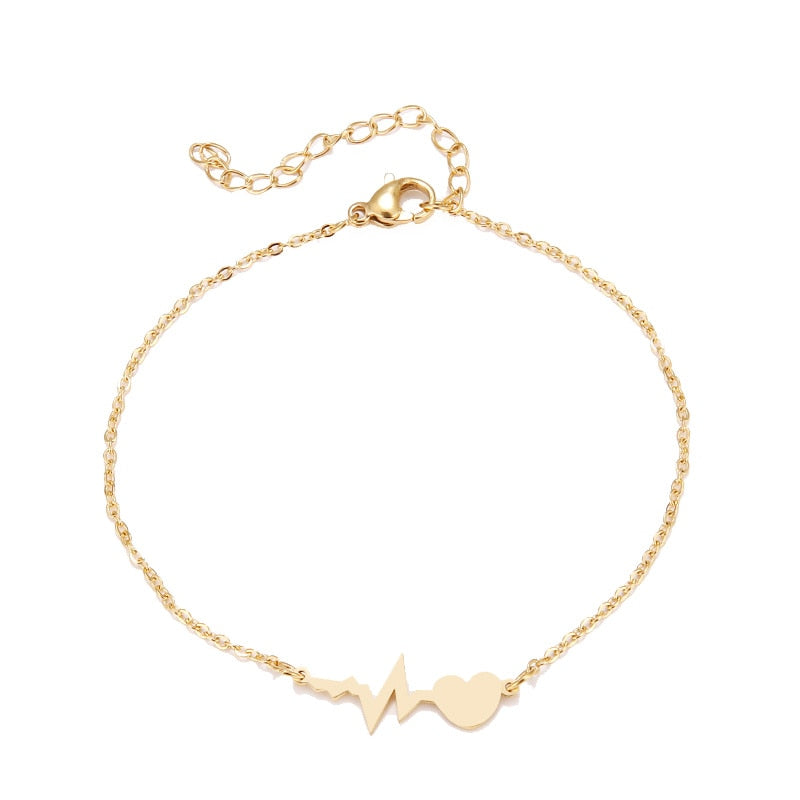 Elegant gull hjerteslag armbånd for kvinner, minimalistisk smykke, perfekt som gave eller personlig tilbehør.