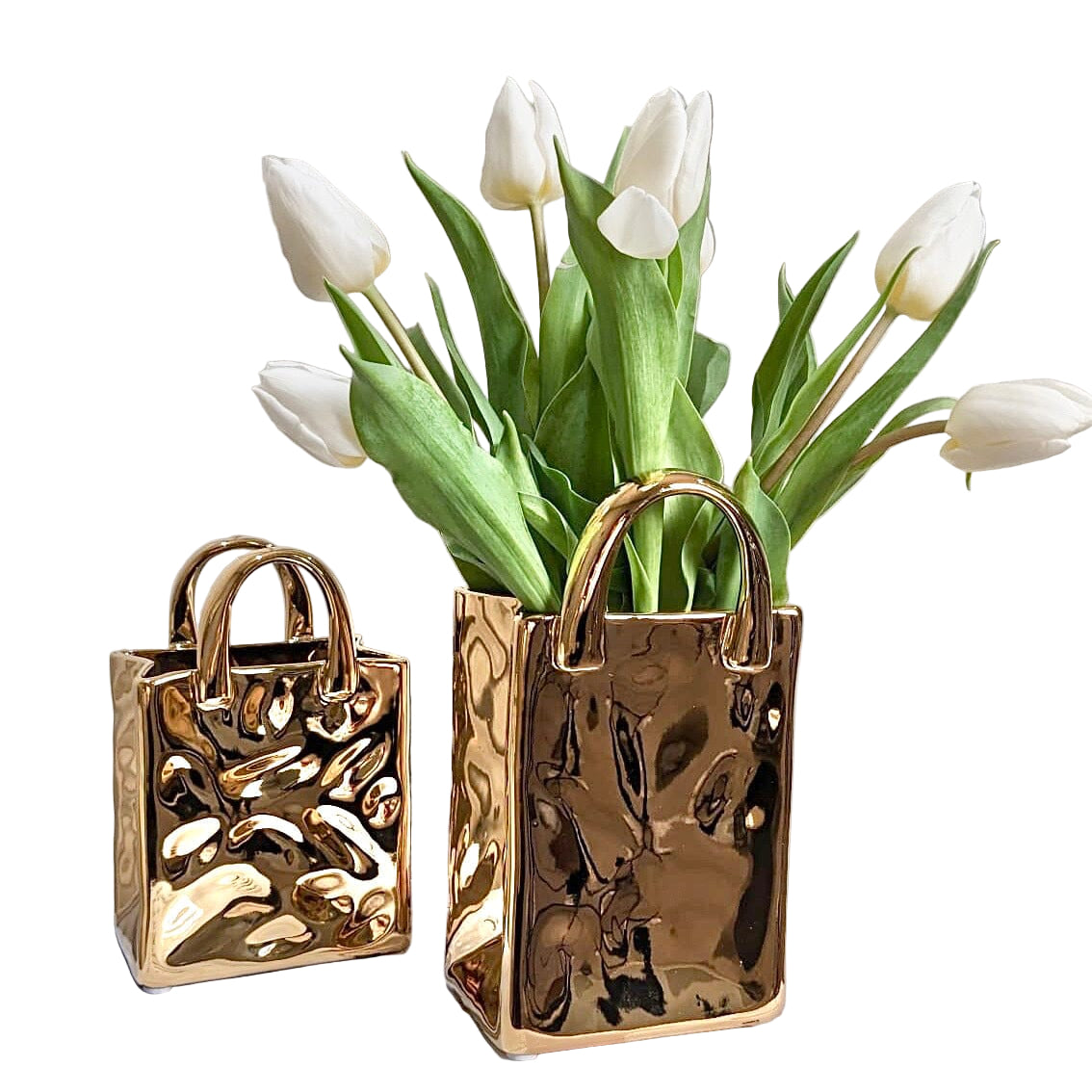 Elegant gullvase med unikt veskedesign, perfekt for luksuriøs hjemmedekor og blomster.